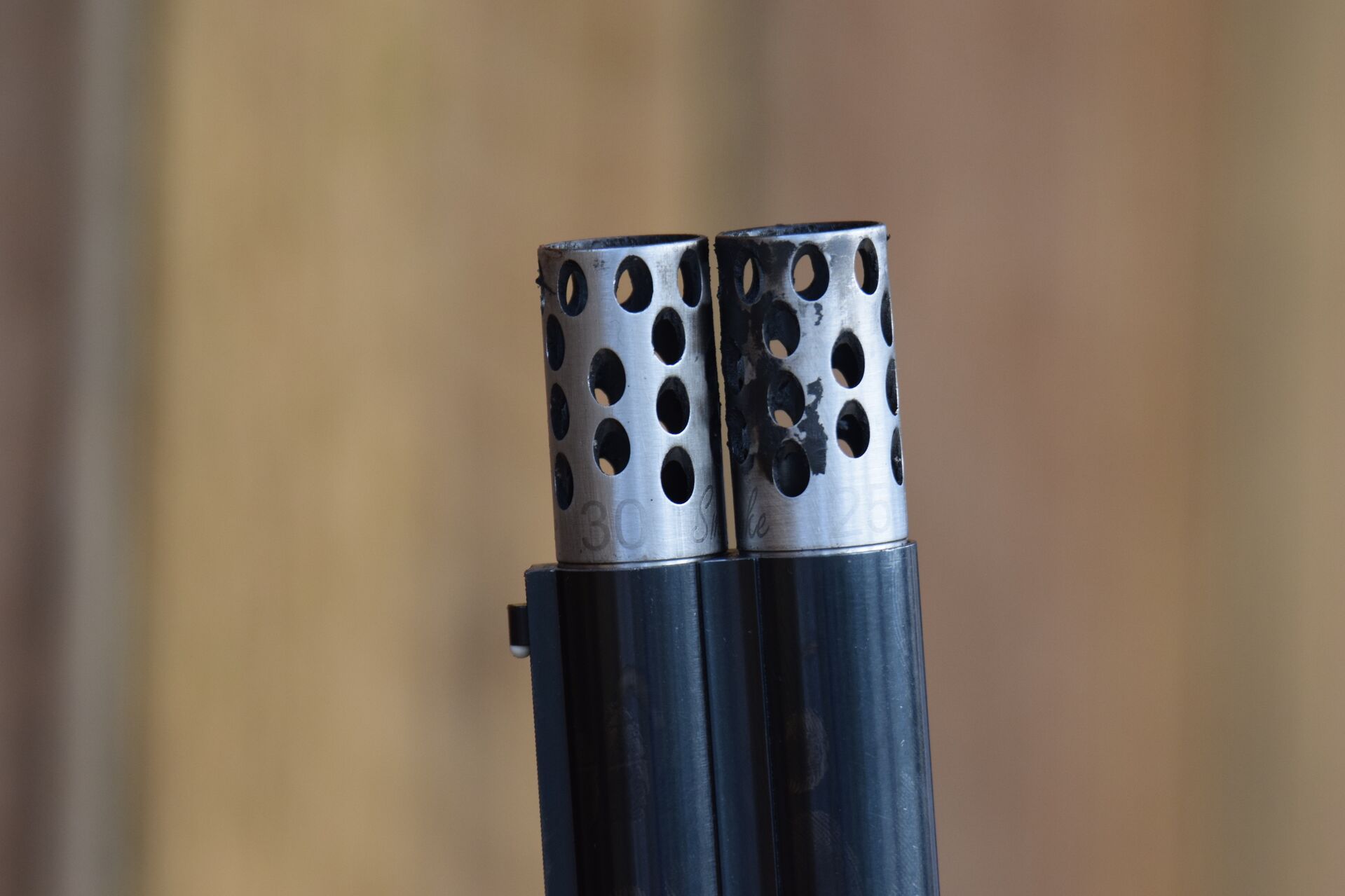 Close-up of a shotgun choke, shotgun accessories concept. 