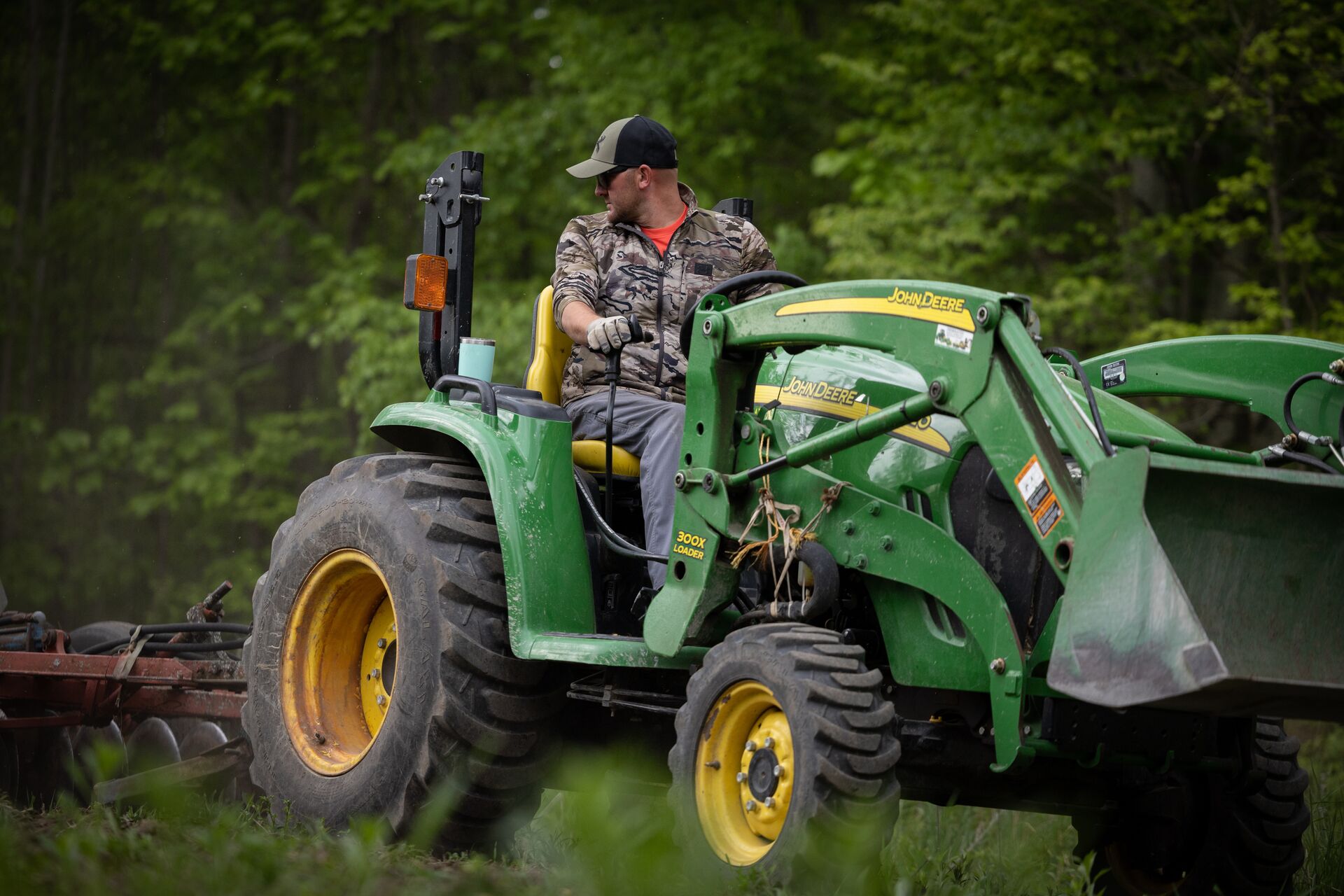 Hunter on a tractor. 